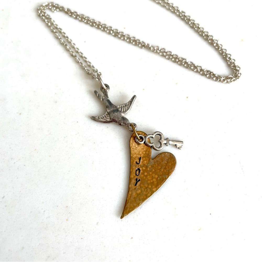 Artisan Silver and Copper Charm Joy Necklace